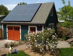 a garage with solar panels installed on the roof